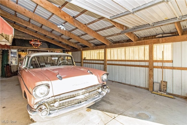 garage featuring metal wall