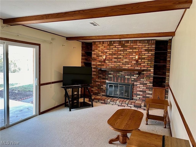 living room with visible vents, baseboards, carpet, beam ceiling, and a fireplace