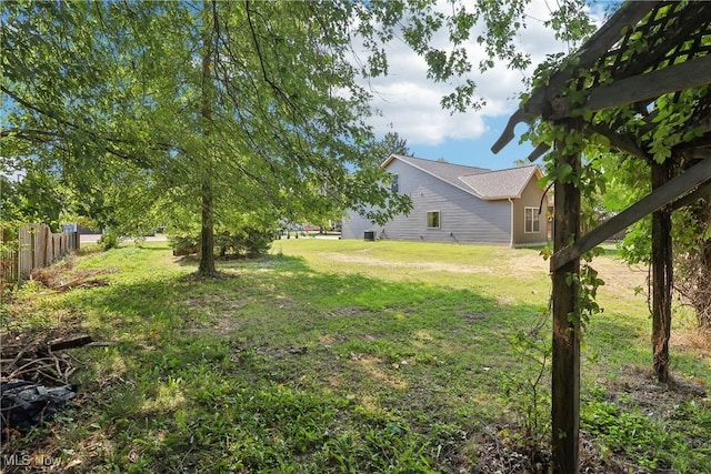 view of yard with fence