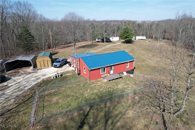 drone / aerial view with a view of trees