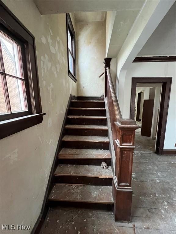 stairway with baseboards