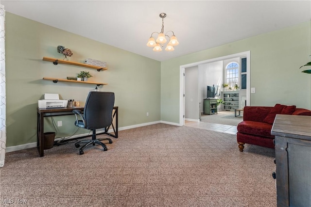 office with baseboards, carpet floors, and an inviting chandelier