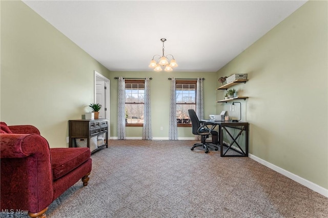 carpeted office featuring a chandelier, lofted ceiling, and baseboards