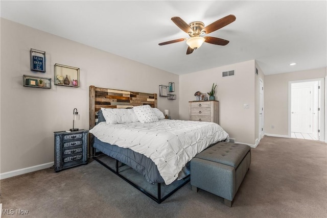 carpeted bedroom featuring recessed lighting, visible vents, baseboards, and a ceiling fan