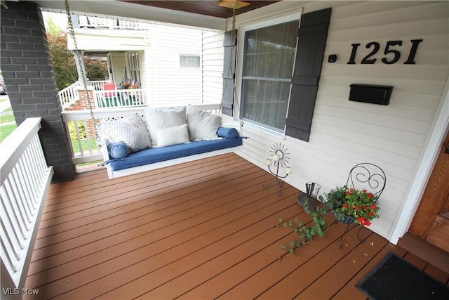 wooden deck with covered porch