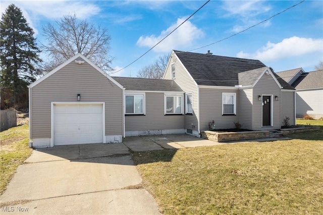 view of front of property featuring concrete driveway, an attached garage, a front lawn, and roof with shingles