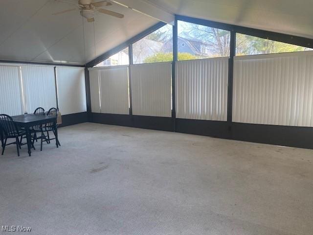 sunroom / solarium with vaulted ceiling and ceiling fan