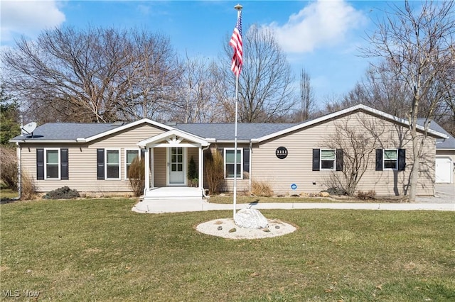 ranch-style home featuring a front lawn