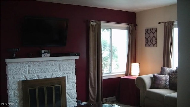 living room featuring a fireplace