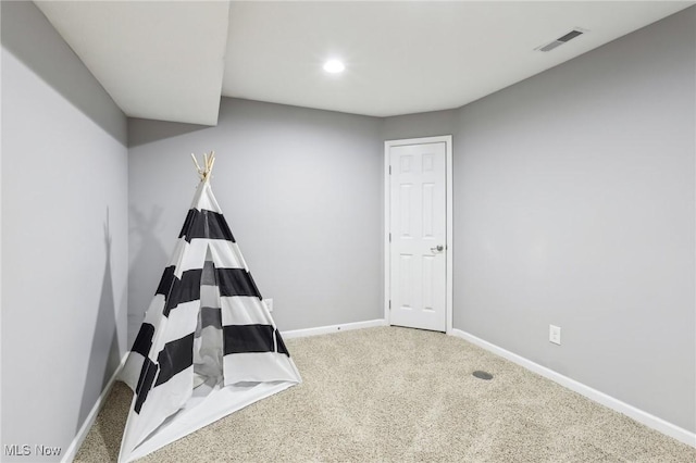 recreation room featuring recessed lighting, carpet, visible vents, and baseboards