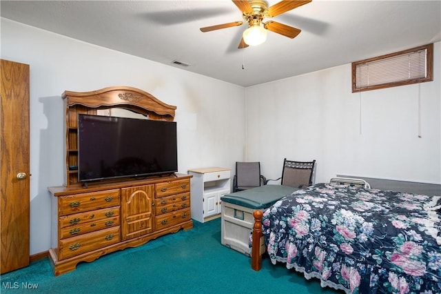 carpeted bedroom featuring visible vents and ceiling fan