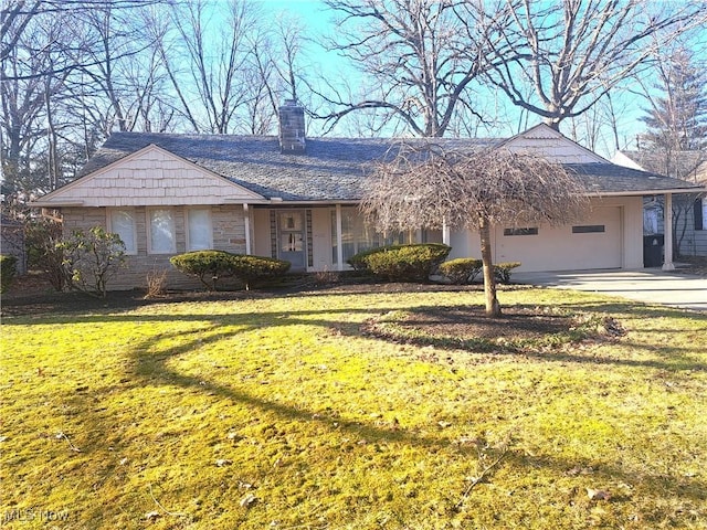 ranch-style home featuring an attached carport, concrete driveway, a front yard, and a chimney