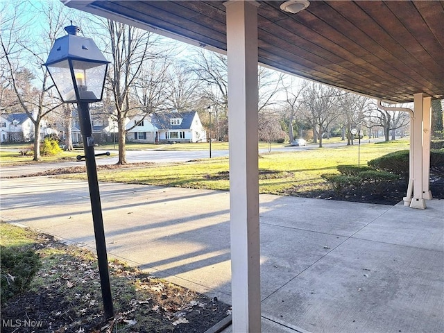 view of patio / terrace with a residential view