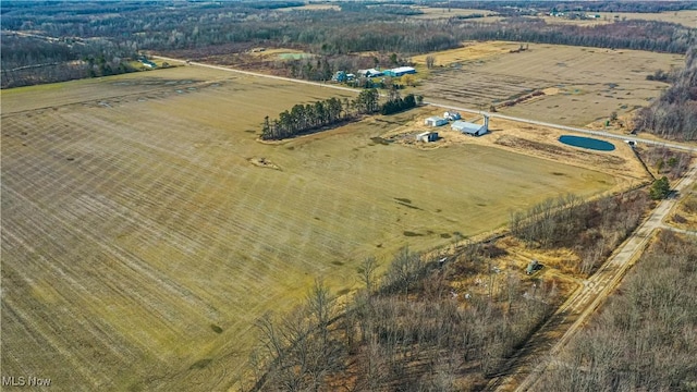 birds eye view of property featuring a rural view