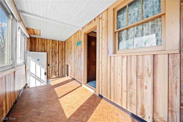 hallway with wooden walls