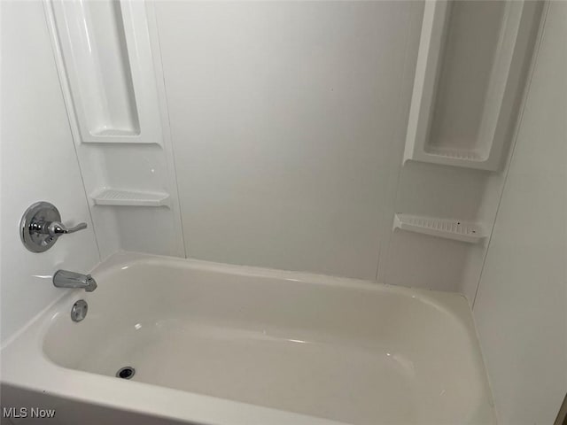 bathroom featuring shower / washtub combination