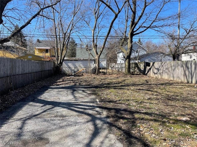 view of yard featuring fence private yard