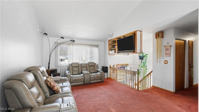 living room with lofted ceiling and carpet floors