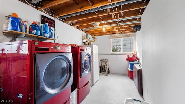 washroom featuring independent washer and dryer