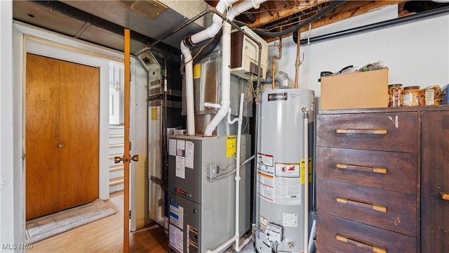 utility room with water heater