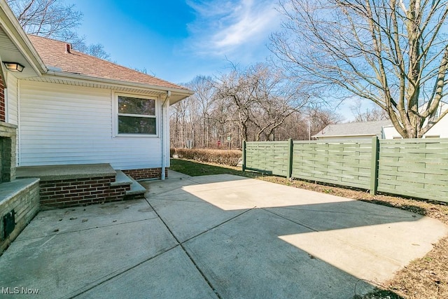 view of patio with fence