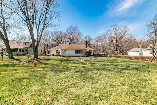 view of yard with fence