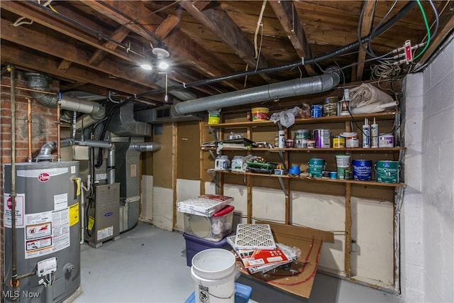 unfinished basement featuring heating unit and water heater