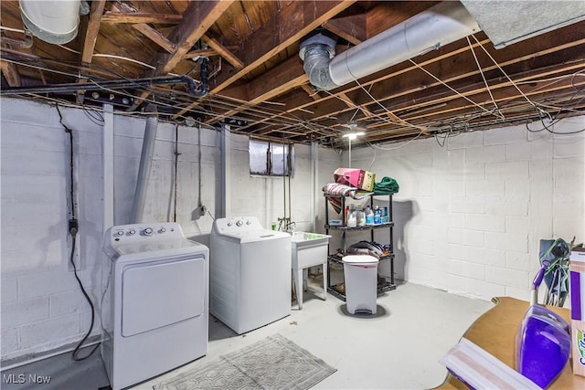 unfinished basement featuring separate washer and dryer