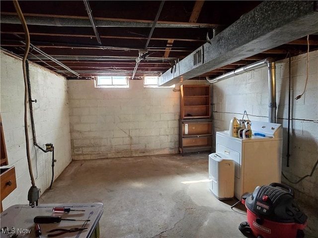 basement with washer / dryer