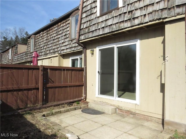 view of patio / terrace featuring fence