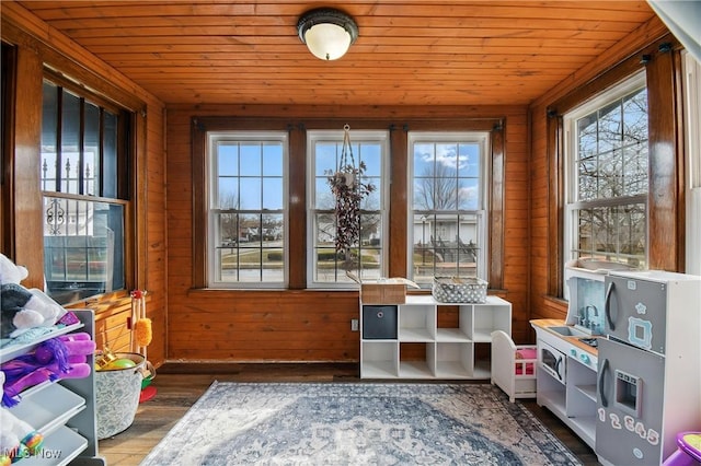 interior space featuring wood ceiling