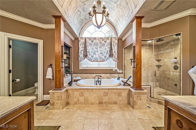 bathroom featuring a bath, ornate columns, a stall shower, crown molding, and toilet