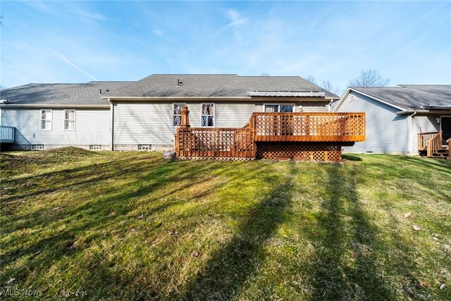 421 Hills Creek Rd, Brookfield, OH 44403 - rear view of property featuring a wooden deck and a lawn