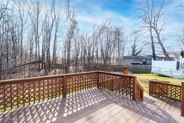 421 Hills Creek Rd, Brookfield, OH 44403 - wooden deck featuring a yard and fence