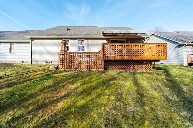 421 Hills Creek Rd, Brookfield, OH 44403 - rear view of property with a wooden deck and a lawn