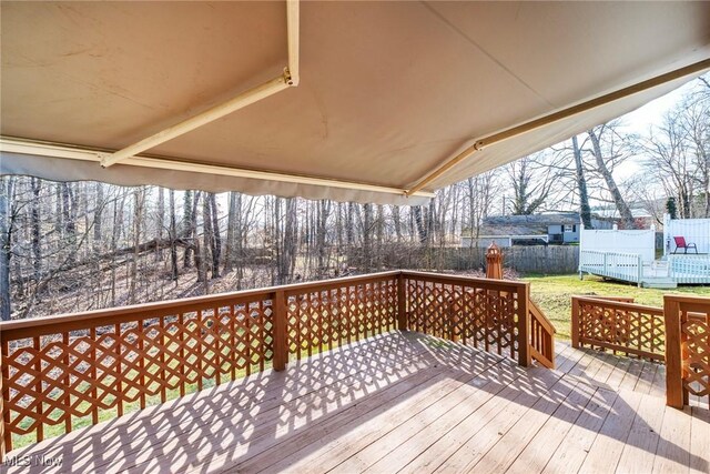 421 Hills Creek Rd, Brookfield, OH 44403 - wooden terrace featuring fence and a yard
