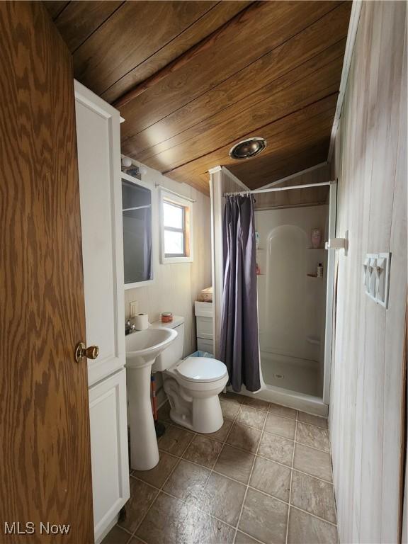 17875 Lashley Rd, Senecaville, OH 43780 - bathroom featuring tile patterned flooring, a shower stall, wooden ceiling, and toilet