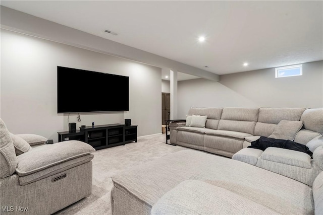 living room featuring visible vents, recessed lighting, baseboards, and light carpet