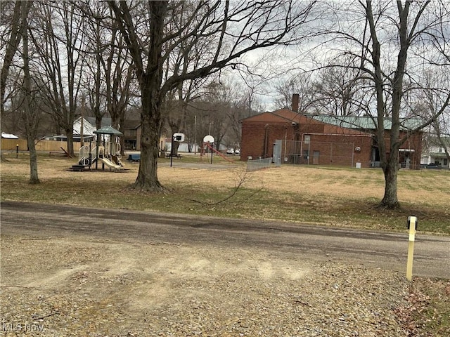 view of yard featuring playground community