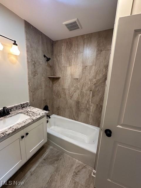 1119 Abbey Pl, Zanesville, OH 43701 - bathroom with vanity, shower / bathing tub combination, and visible vents