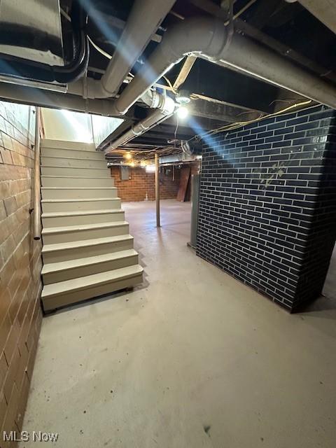 1119 Abbey Pl, Zanesville, OH 43701 - unfinished below grade area featuring stairs