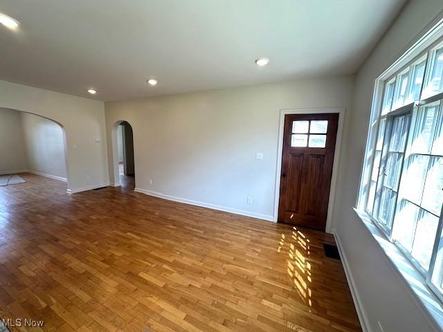 1119 Abbey Pl, Zanesville, OH 43701 - entryway with recessed lighting, baseboards, arched walkways, and wood finished floors