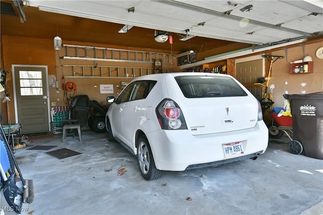 garage featuring a garage door opener