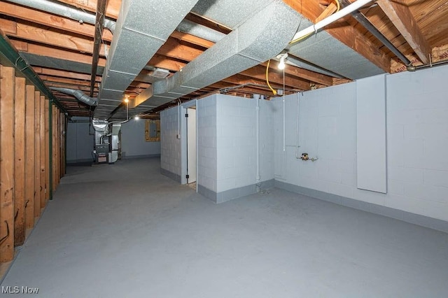 unfinished basement with heating unit