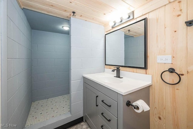 full bath with vanity and a stall shower