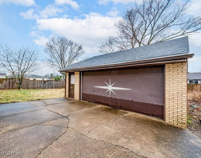 garage featuring fence