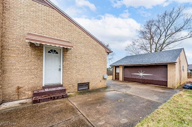 exterior space featuring brick siding