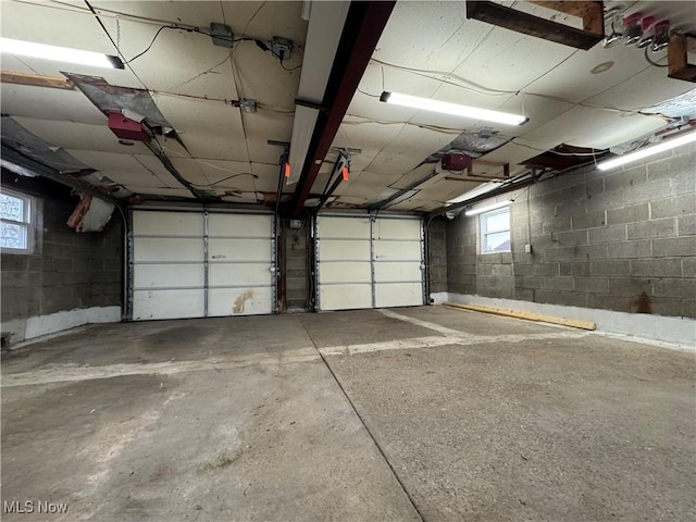 garage featuring concrete block wall