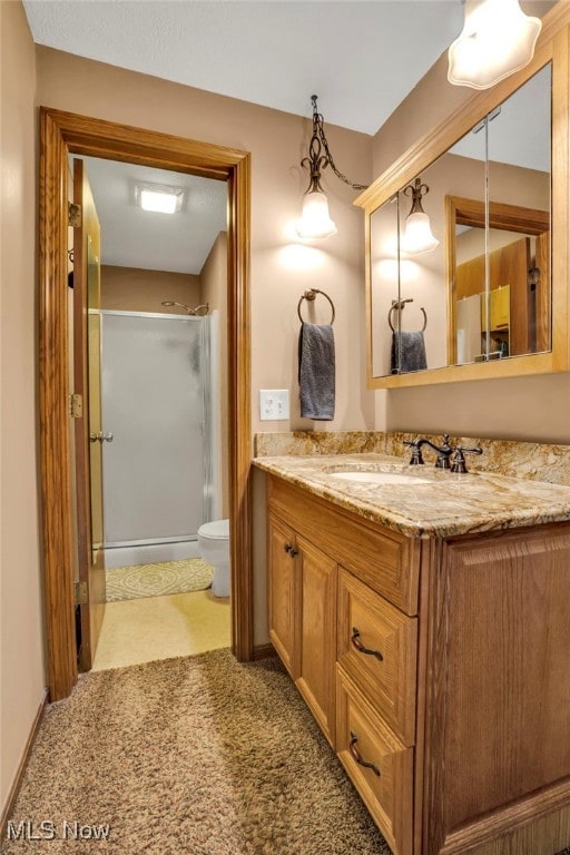 1580 Salway Ave SW, North Canton, OH 44709 - full bath with vanity, toilet, and a shower stall