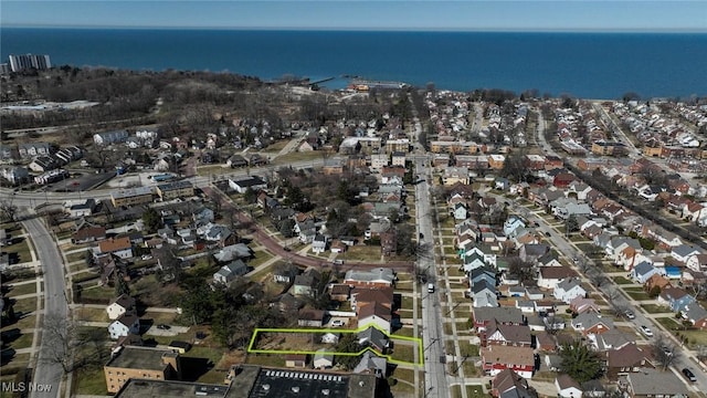 aerial view featuring a residential view and a water view